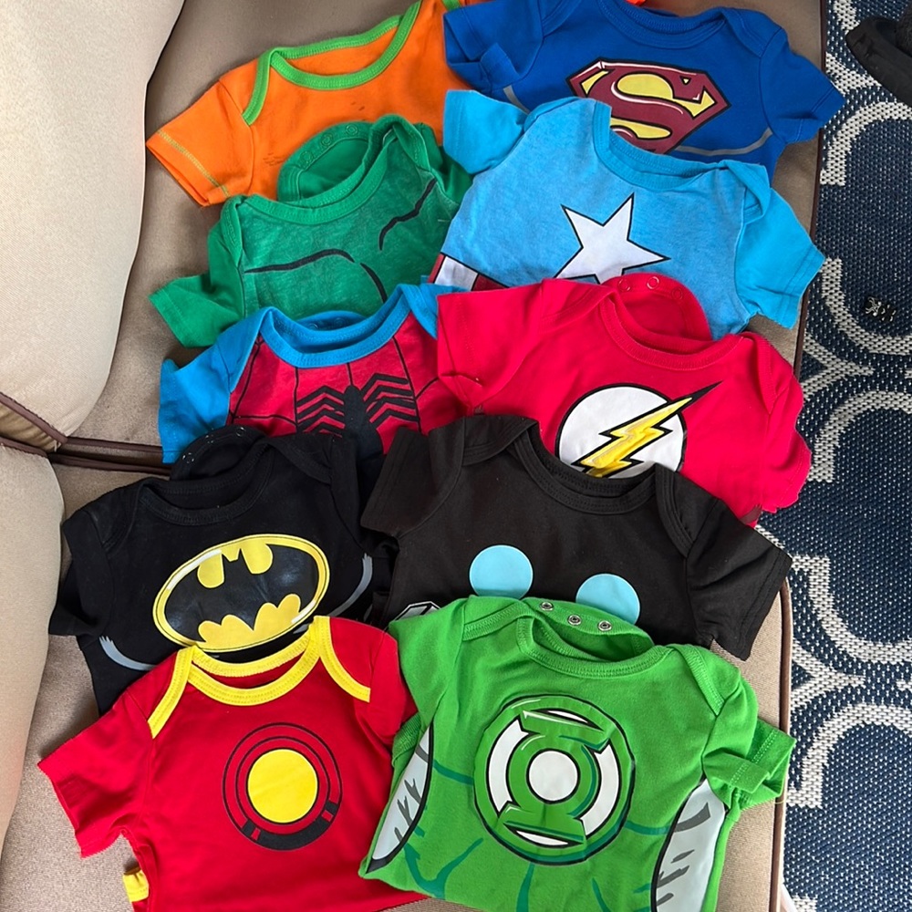 Superhero onesies 3months-12 months (worn once for monthly pictures)